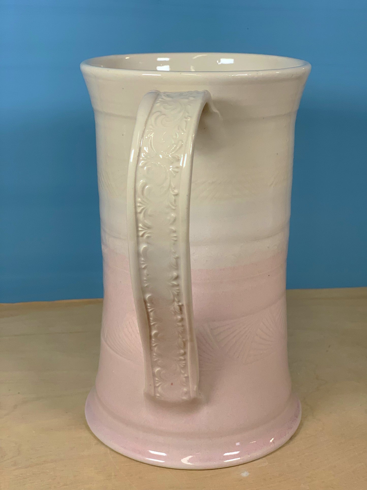 Pink and white stamped beer mug