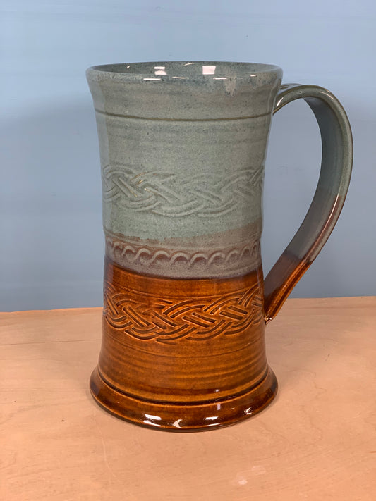 Green and brown stamped beer mug