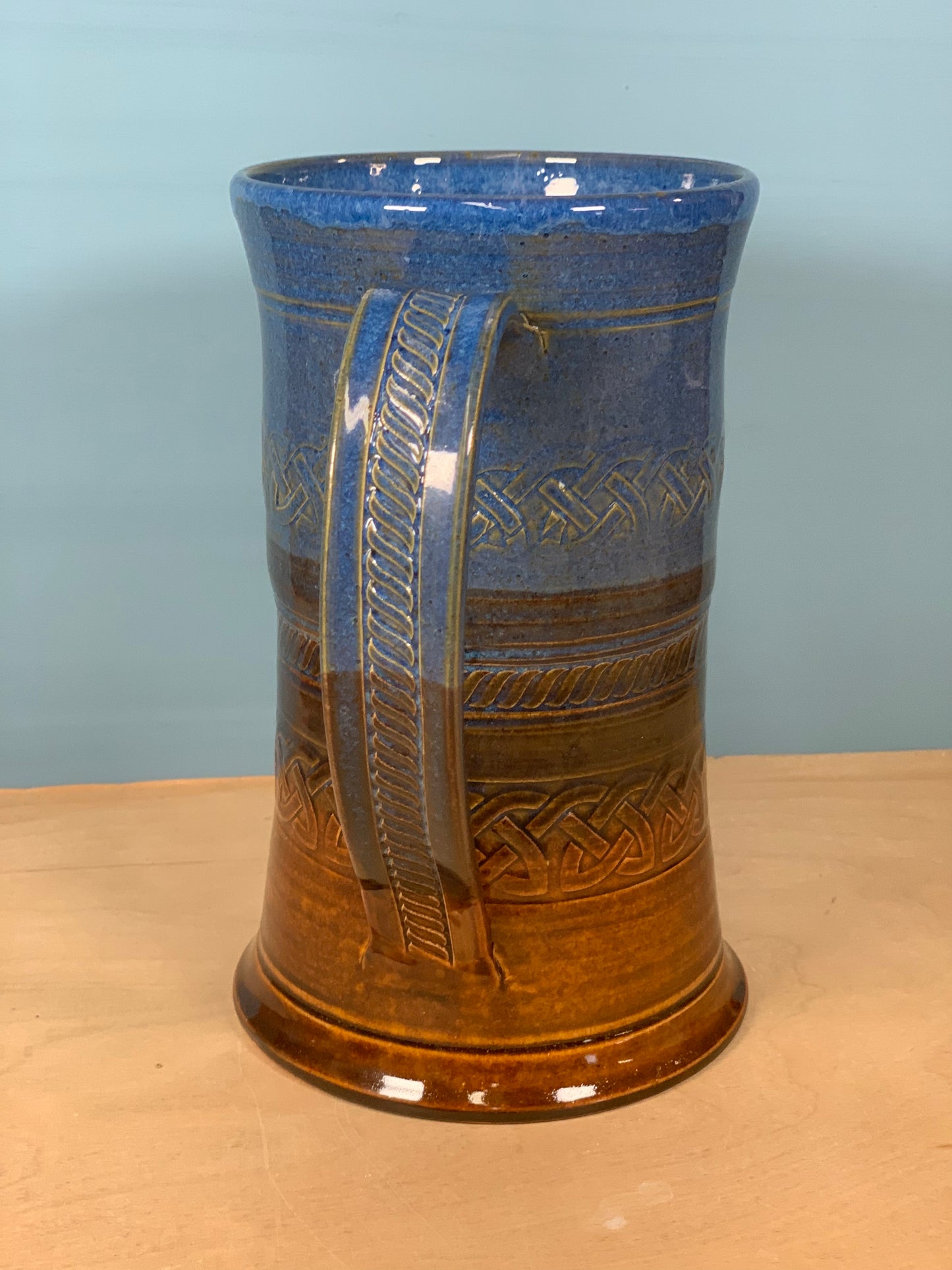 Blue and brown stamped beer mug