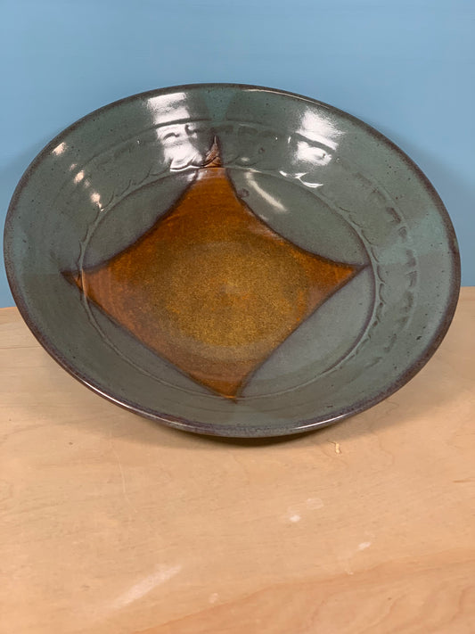 Green and brown stamped bowl