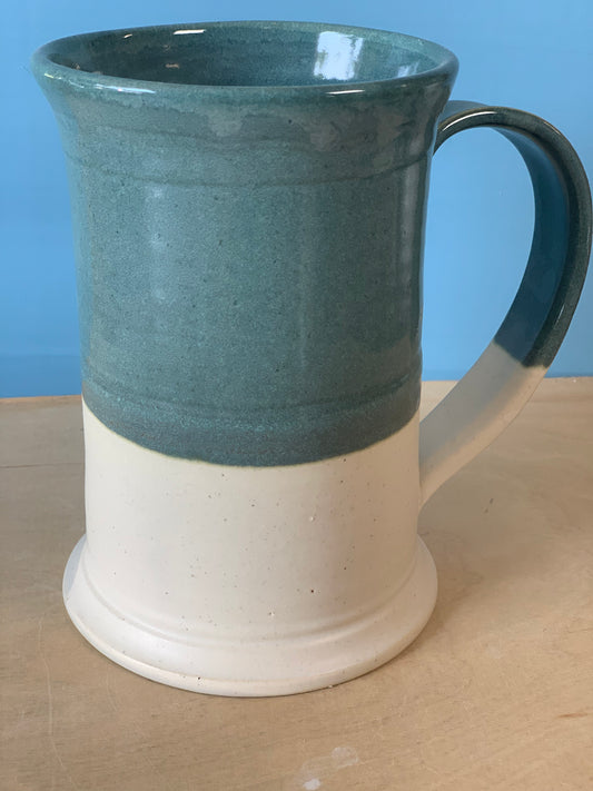 Green and white beer mug