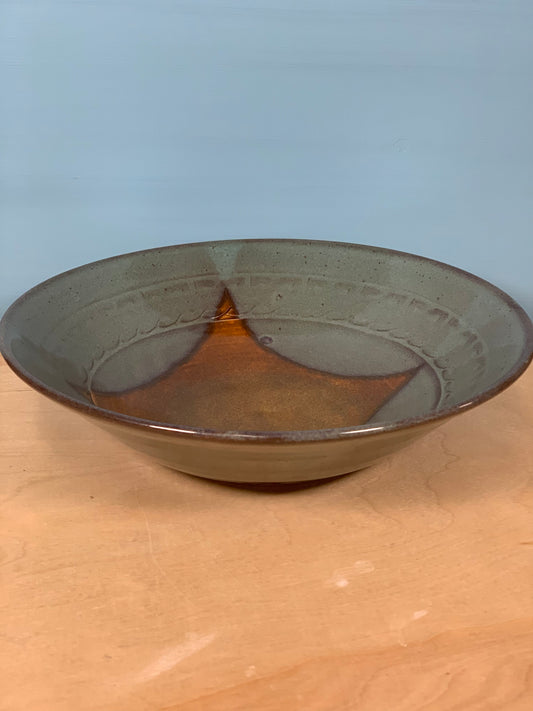 Green and brown stamped bowl