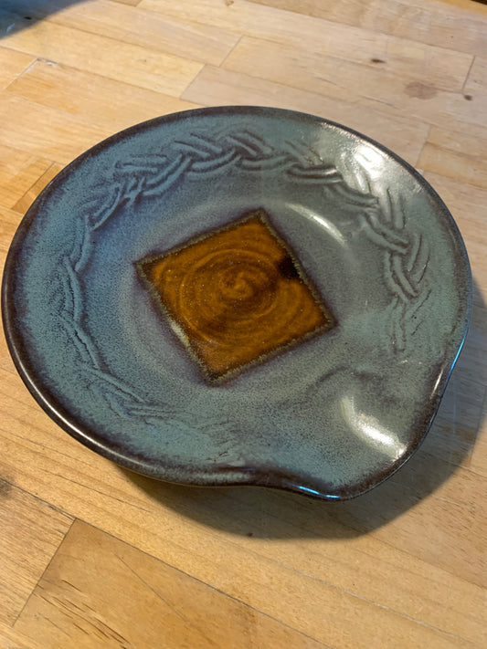 Green and brown spoon dish