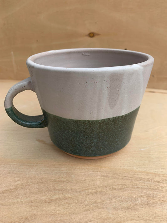 Green and white coffee cup